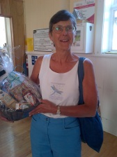 Karen Richter walked away with the gift basket from new health food store Dandelion Foods in Almonte after trading in the birdhouse she won!
